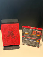 Red Dead Redemption II Ultimate Edition PS4 back of outer box and SteelBook showing Rockstar embossed crest and edge/corner wear on box