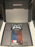 Xbox One 1TB Halo 5 Guardians Limited Edition console front showing UNSC Halo 5 themed finish alongside original outer box