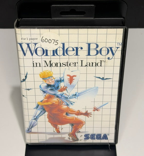 Wonder Boy in Monster Land Sega Master System PAL back cover showing gameplay screenshots multilingual description and Sega Australian Hints and Tips Hotline