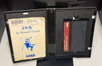 Wonder Boy in Monster Land Sega Master System open case showing heavily worn manual with creased dog-eared corners and yellowing and SMS cartridge