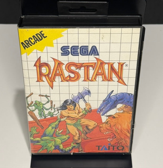 Rastan Sega Master System PAL front cover showing barbarian warrior with axe Arcade badge and Taito branding