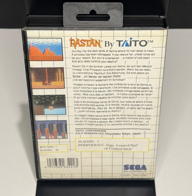 Rastan Sega Master System PAL back cover showing gameplay screenshots multilingual description Taito Corporation Tokyo Japan credit and Sega branding