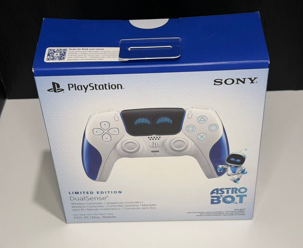 DualSense Limited Edition Astro Bot PS5 controller box front showing white and cobalt blue controller with Astro Bot robot eyes touchpad design