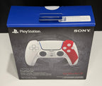 DualSense Limited Edition God of War 20th Anniversary PS5 controller box front showing white and red controller with blue accent and God of War 20th Anniversary logo
