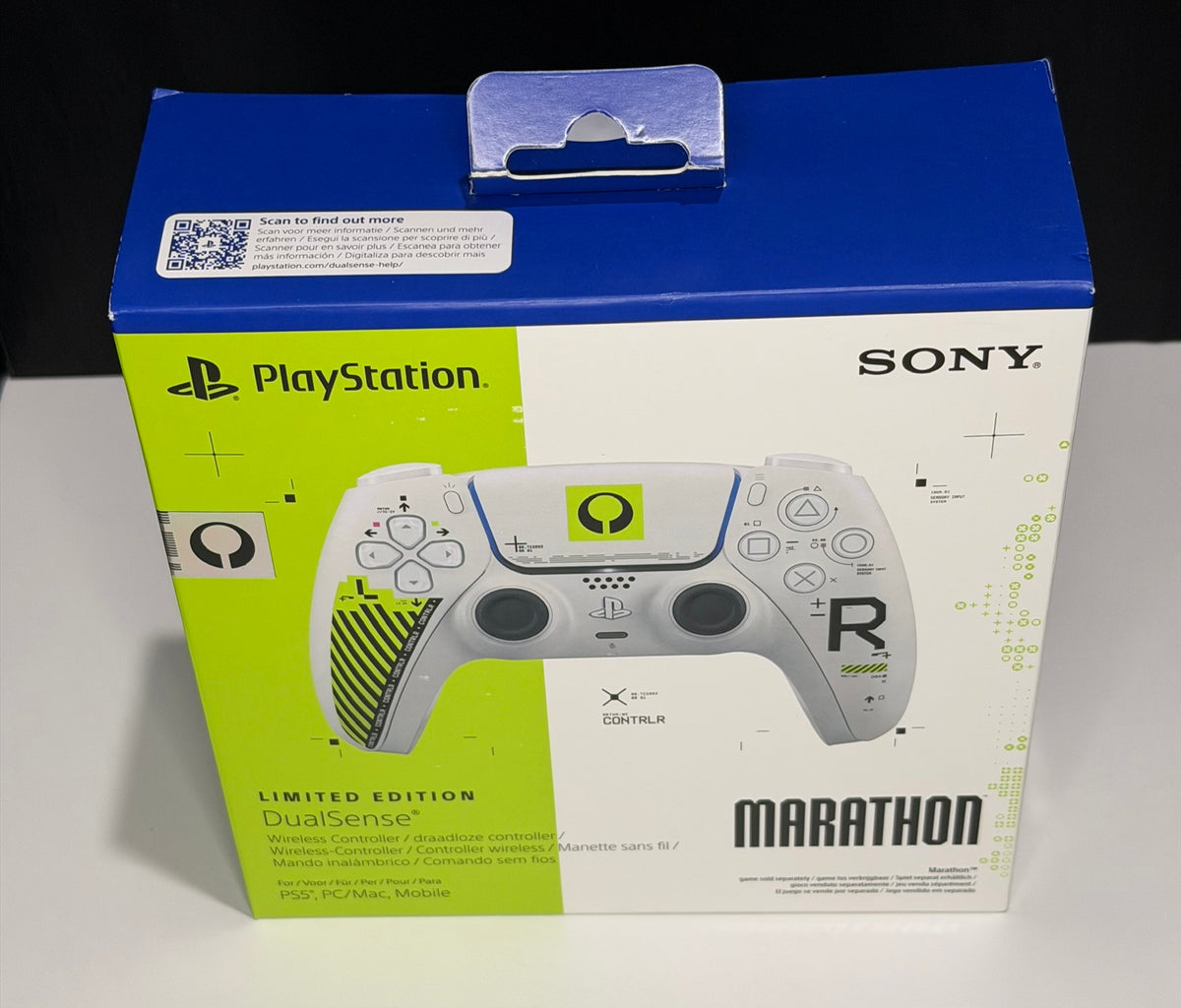 DualSense Limited Edition Marathon PS5 controller box front showing white and neon yellow-green controller with Marathon Q omega symbol touchpad and CONTRLR typography