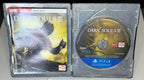 Dark Souls III SteelBook Edition PS4 open case showing Prima Starter Guide on left and Dark Souls III Blu-ray disc ANZ pressing on right
