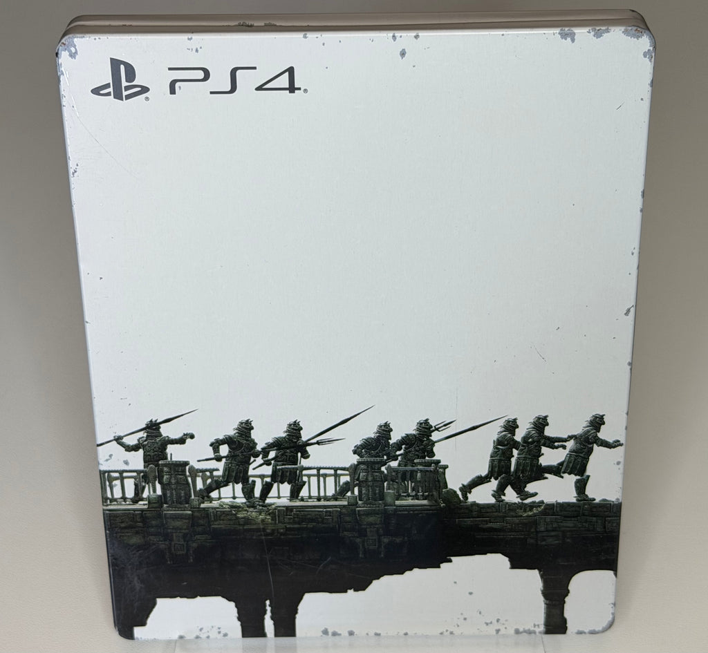 The Last Guardian SteelBook Edition PS4 back showing armoured soldiers marching across a bridge in silhouette on white-ground metal case with scuffs and marks