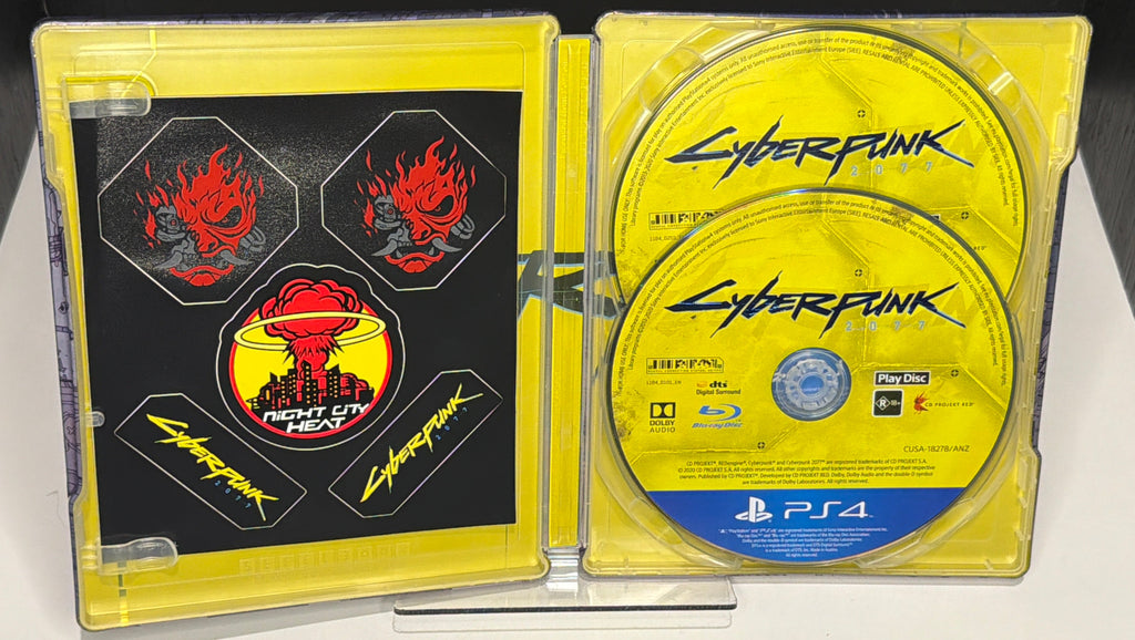 Cyberpunk 2077 – PS4 in SteelBook Case with Physical Extras – PlayStation 4