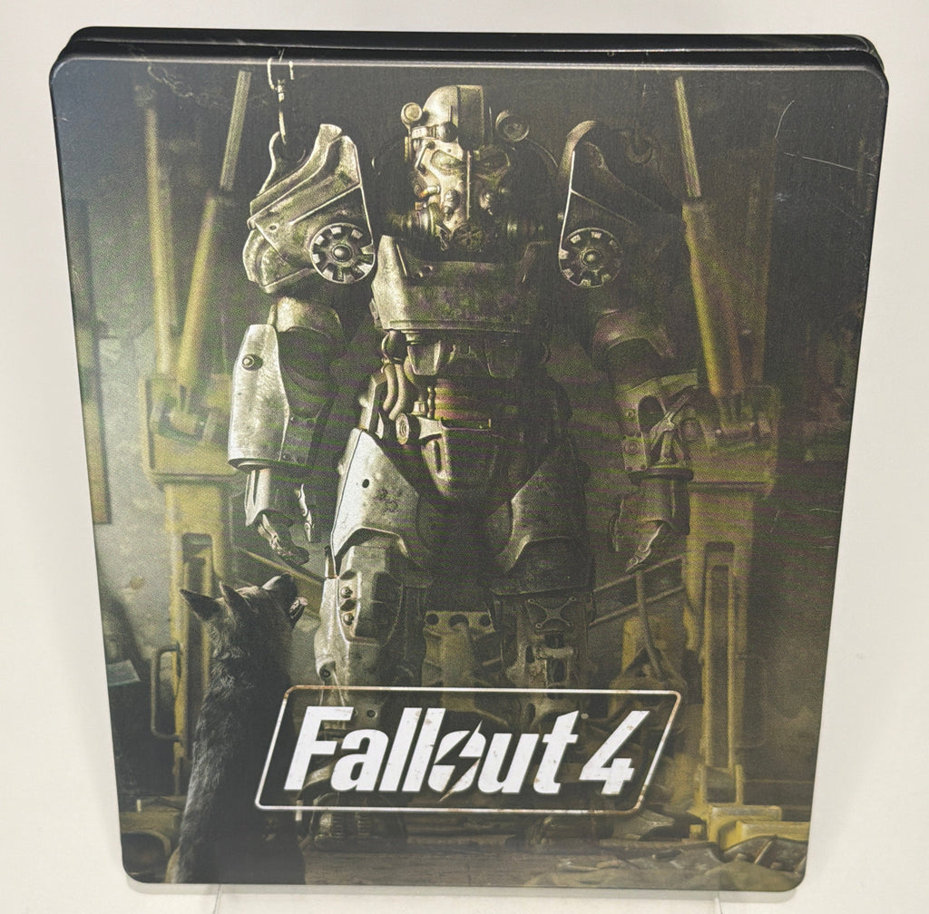 Fallout 4 SteelBook open showing disc and 3 art cards