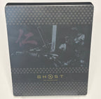 Ghost of Tsushima Special Edition SteelBook open showing disc and digital voucher card