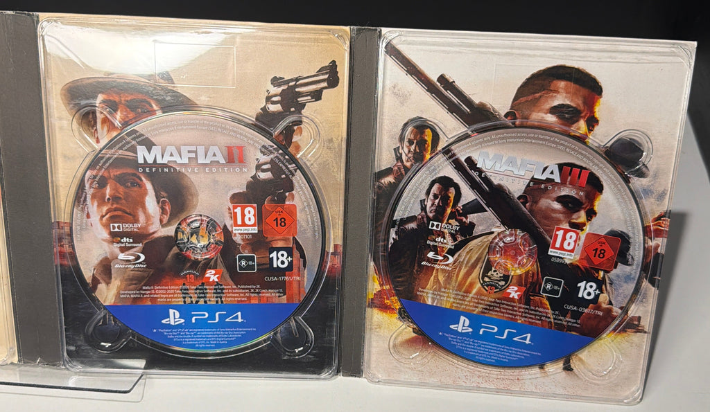 Mafia Trilogy PS4 - inside right: Mafia II (CUSA-17463) and Mafia III (CUSA-07837) discs